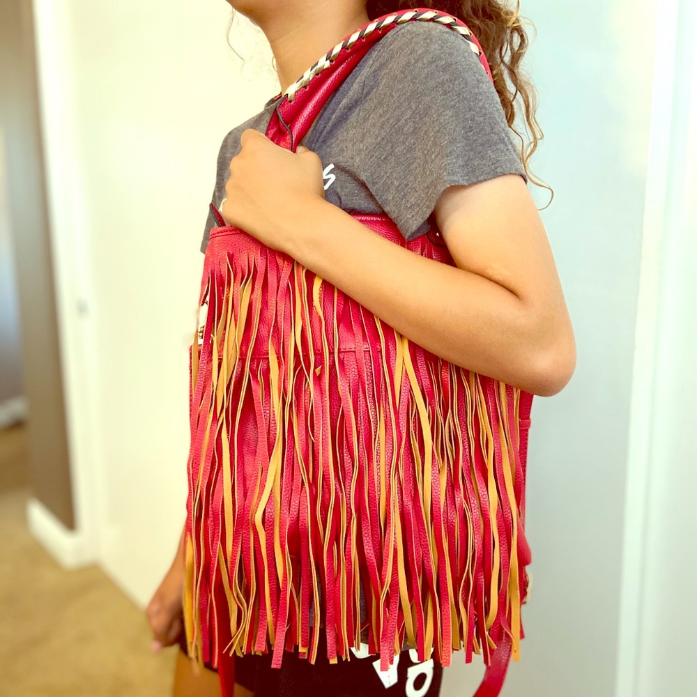 Re/tan fringe crossbody handbag/purse.
